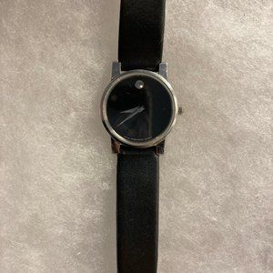 Ladies Classic Movado Black Band wrist watch with single crystal